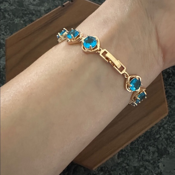 PRETTY BIRD JEWELRY 18K ROSE GOLD PLATED BRACELET WITH TURQUOISE BLUE STONES - Picture 3 of 6